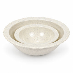 Three nested ceramic mixing bowls with a speckled cream finish and scalloped edges, shown on a clean white background.
