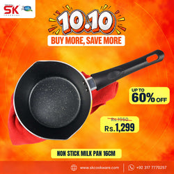 A promotional product graphic for a 16cm non stick milk pan. The pan, with a black non-stick interior and a black handle, is shown resting on a red cloth against a bright orange and yellow background.