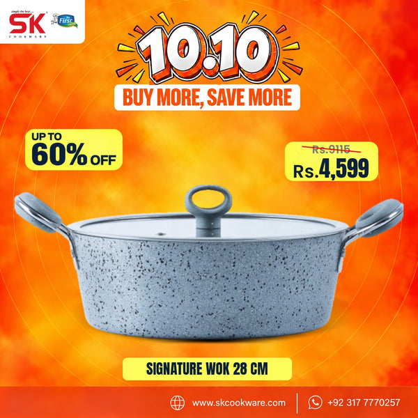 A promotional product graphic for a SK Cookware 28 cm signature wok. The wok has a speckled light gray exterior and a silver metallic interior, shown against a vibrant orange and yellow background with sale text overlays.