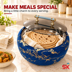 A decorative ceramic serving bowl with a clear glass lid and gold floral detailing, shown on a kitchen counter with flatbread inside. Promotional text at the top reads 'MAKE MEALS SPECIAL' and a '5K Crockpats' logo appears in the bottom right corner.